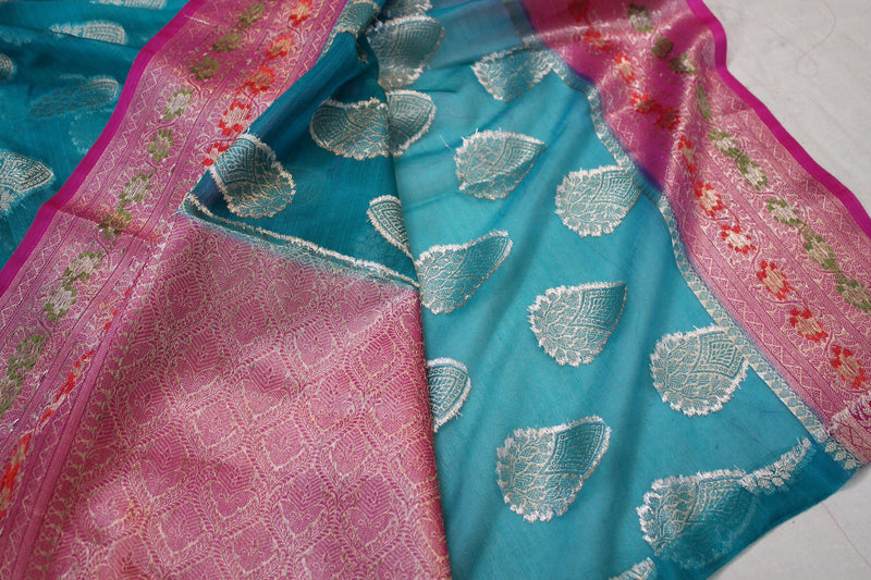 Sea blue Kora Organza Handloom Banarasi Saree with pink border.