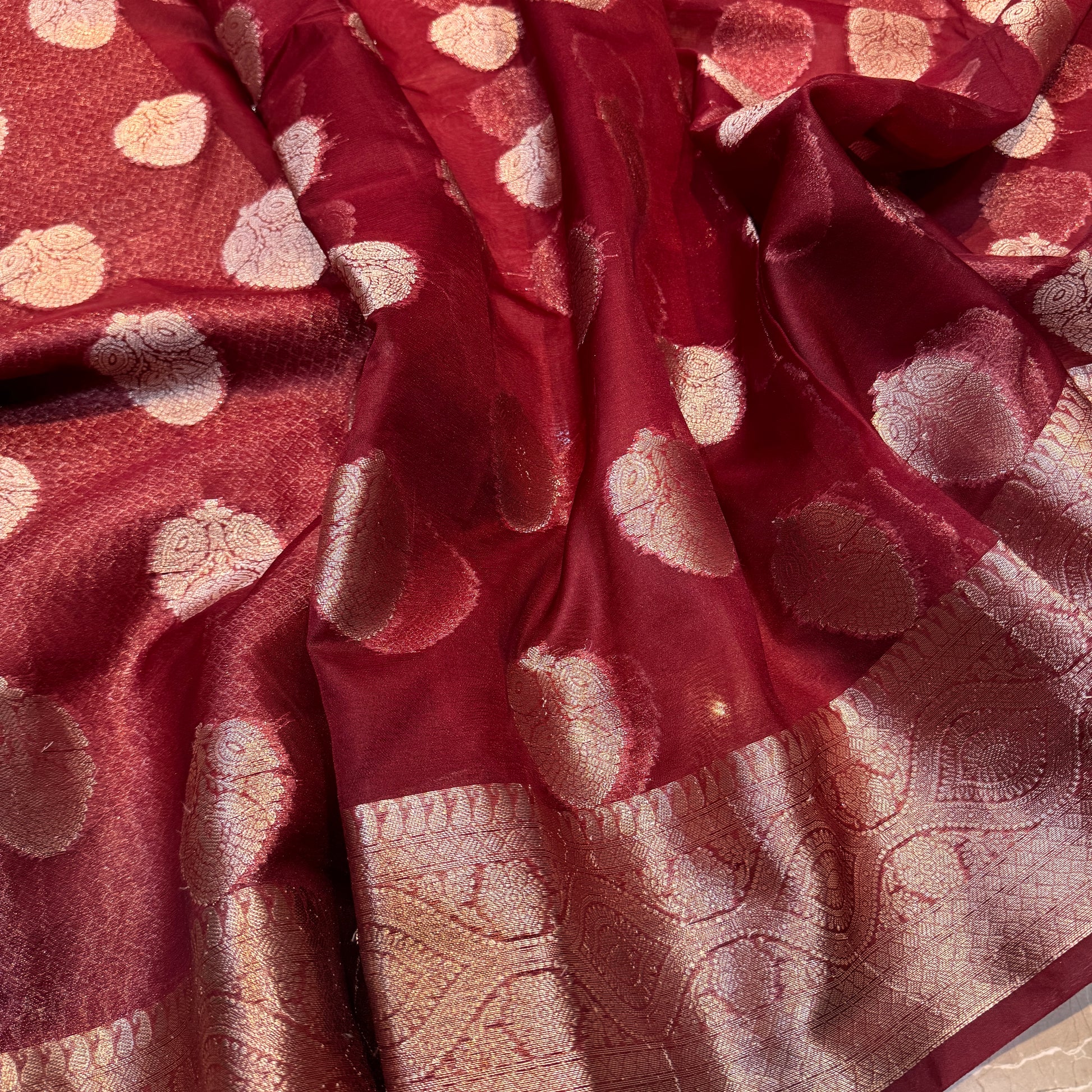 Maroon Cotton Organza Handloom Saree with Gold Zari Butis by Shades Of Banaras - banarasi - banarasi saree shop - banarasi saree manufacturers - banarasi saree wholesale - banaraasi sarees - banarasi sari - banarasi saris
