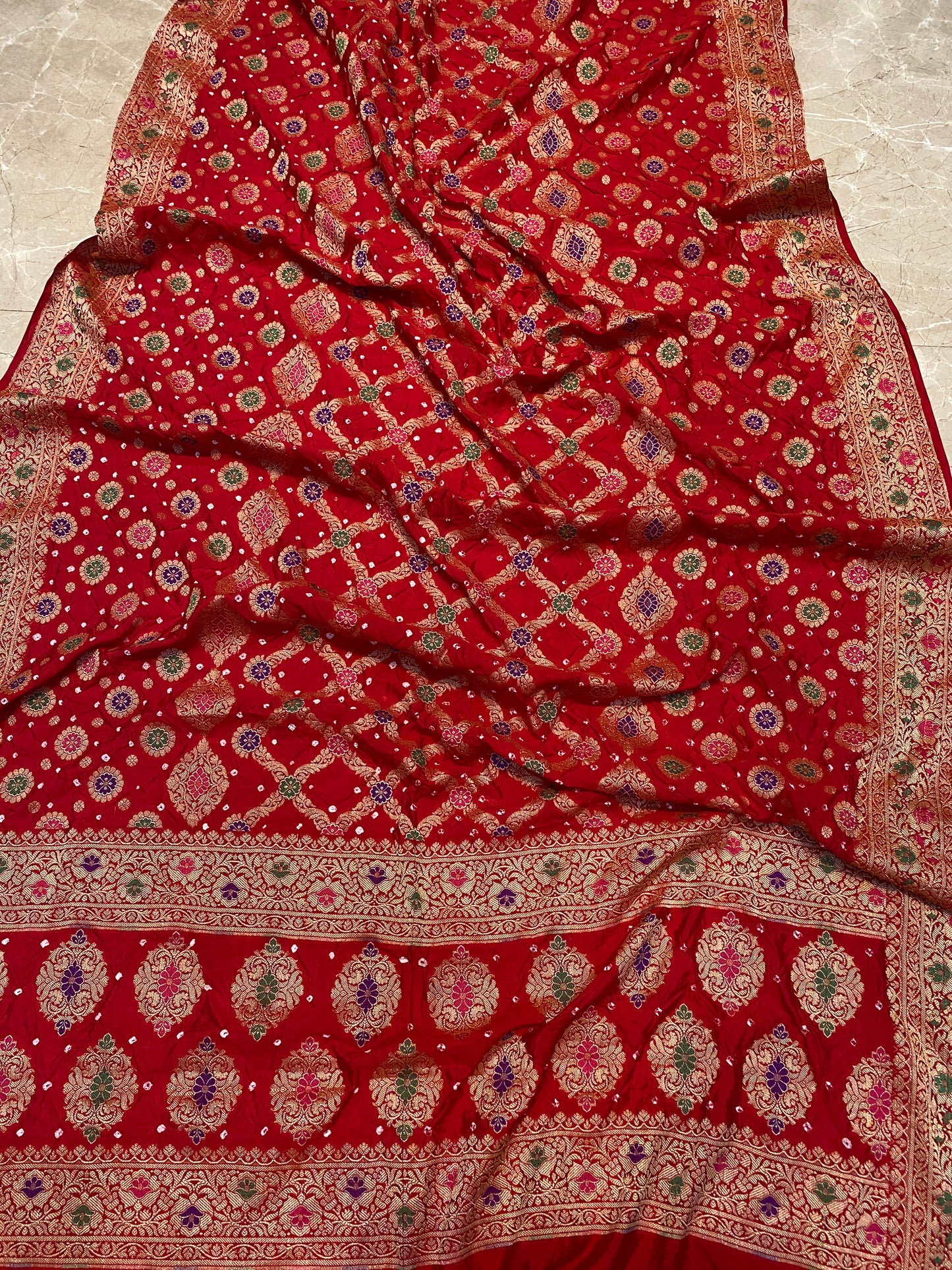 Classic Red Chiffon Banarasi Bandhani Saree with Minakari Work by Shades Of Banaras - banarasi - banarasi saree shop - banarasi saree manufacturers - banarasi saree wholesale - banaraasi sarees