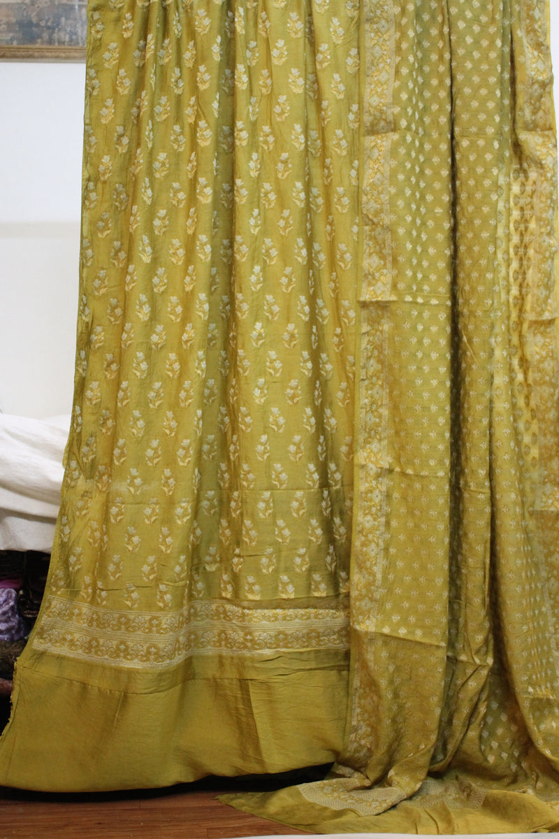 Elevate your style with a 3-piece Cotton Silk Banarasi Dress Material Set by Shades of Benares.
