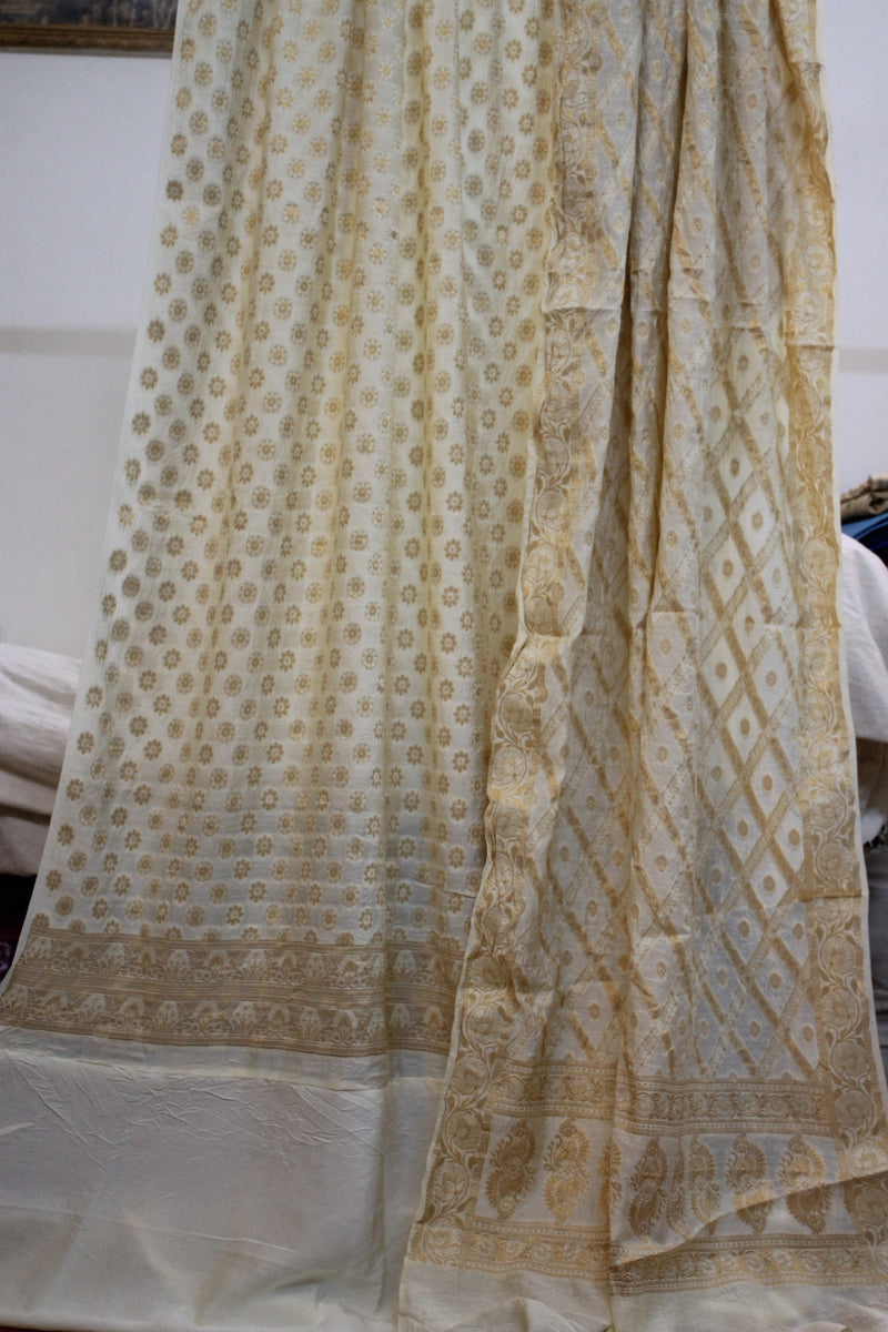Pure Elegance: White Handloom 3 Pcs Cotton Silk Banarasi Dress Material by shades of benares.