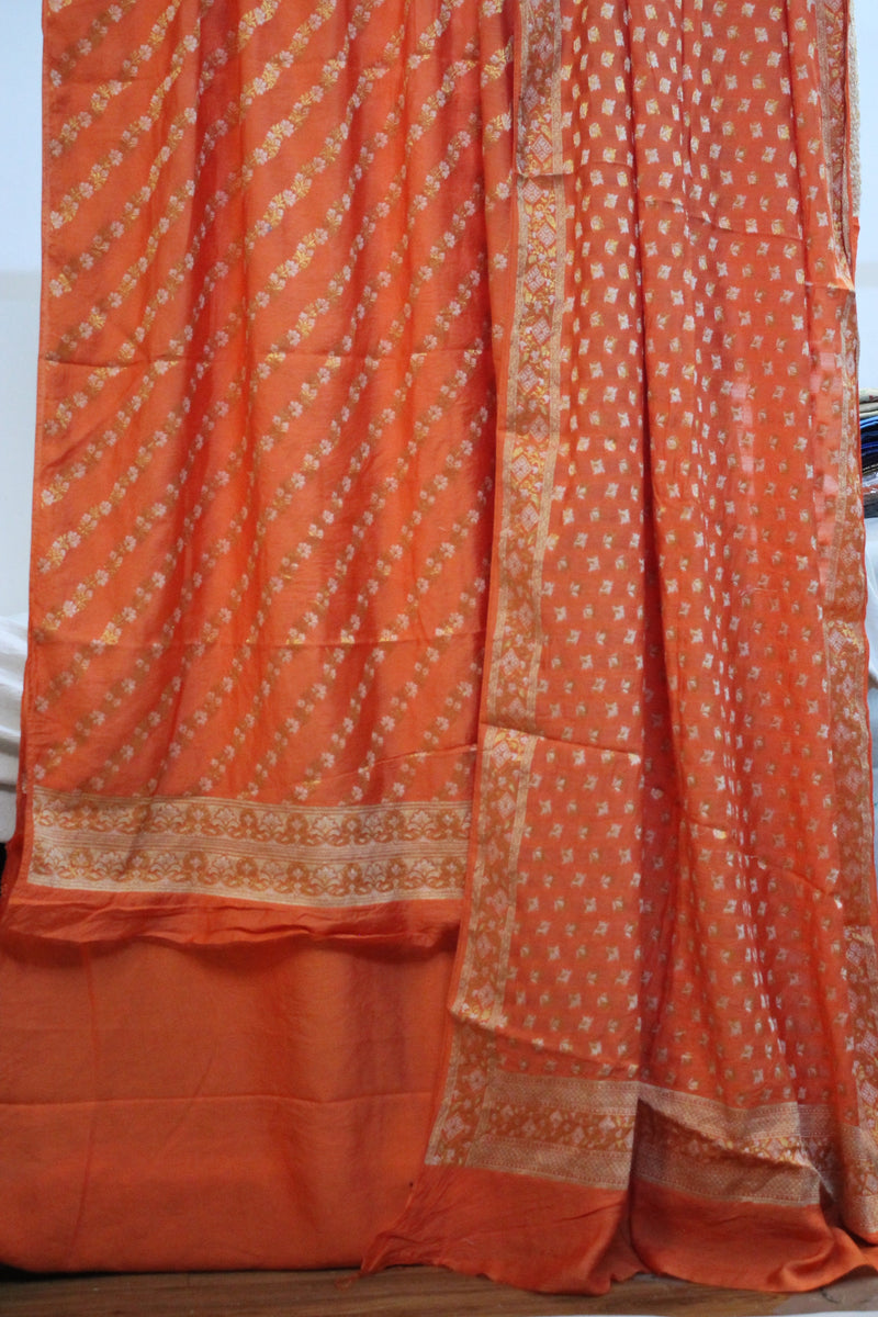 Vibrant orange handloom 3-piece cotton silk Banarasi suit set by Shades of Benares.