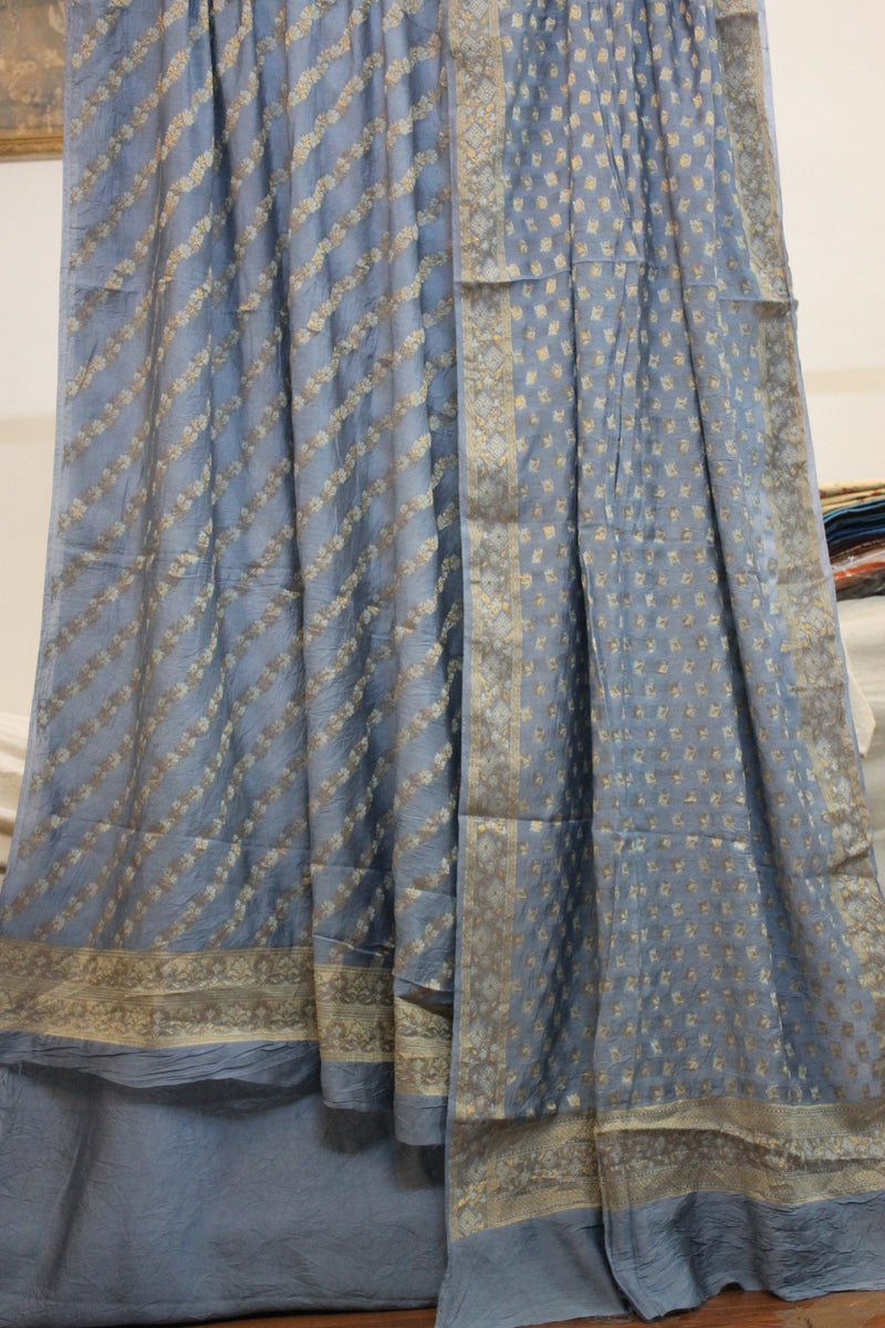 Elegant grey 3-piece cotton silk Banarasi suit set by Shades of Benares, showcasing sophisticated handloom craftsmanship.