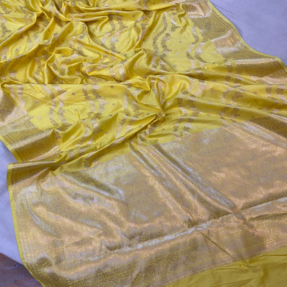 Discover the Luxurious Silk Elegance of a Bright Yellow Crepe Silk Handloom Saree by Shades Of Benares - banarasi - banarasi saree shop