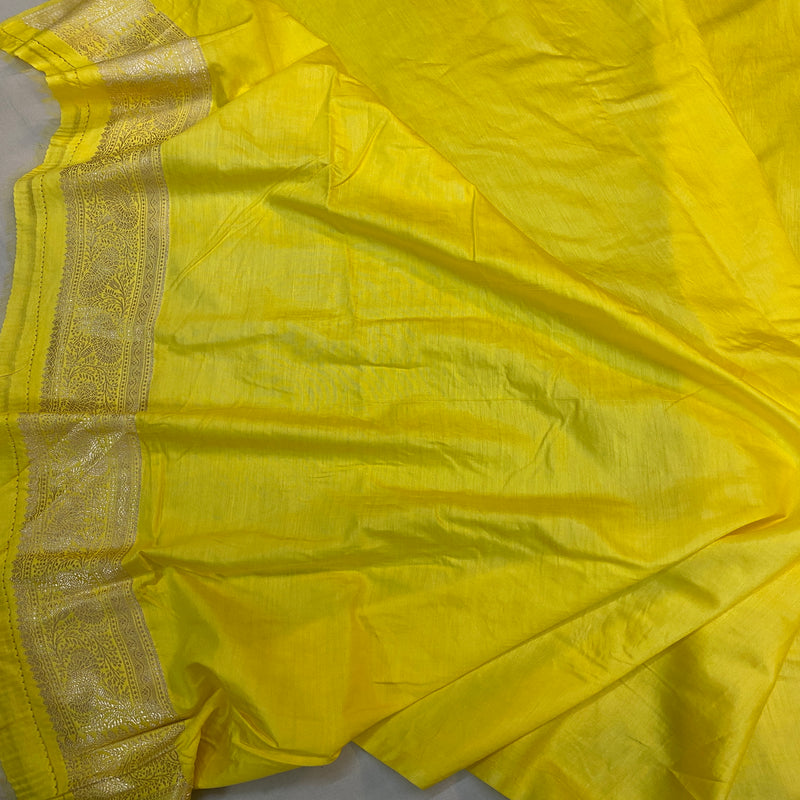Yellow crepe silk handloom saree with luxurious silk elegance.
