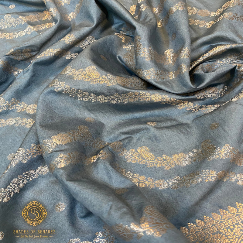 Metallic grey Banarasi saree made of handloom crepe silk.