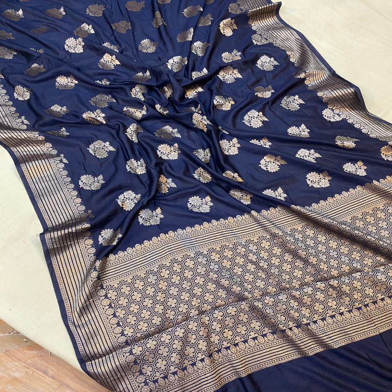 Elevate your style with our navy blue crepe silk handloom Banarasi saree, perfect for parties and special occasions. Shop now for timeless elegance!