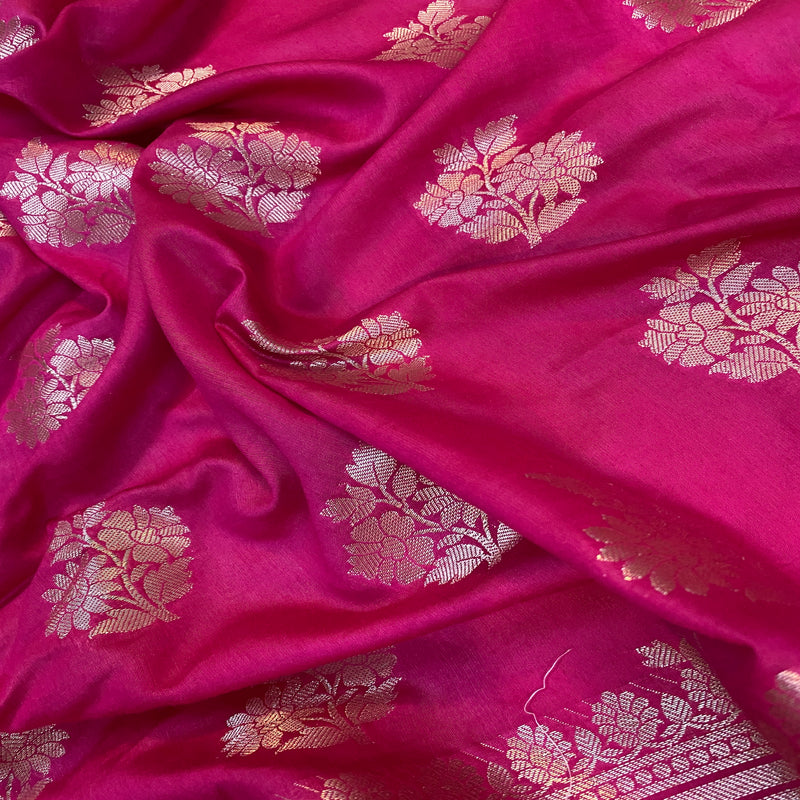Shop our elegant Raani pink silk handloom Banarasi saree, perfect for weddings and special occasions. Embrace traditional craftsmanship and timeless elegance.