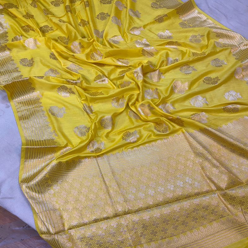 Elevate your style with our vibrant yellow handloom Banarasi silk saree, ideal for special occasions.