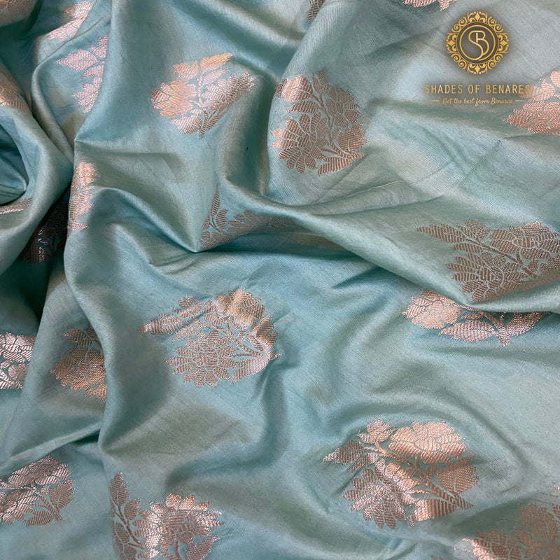 Serene sea blue handloom Banarasi silk saree, perfect for special occasions. Exudes timeless elegance and versatility. Shop now and stand out!