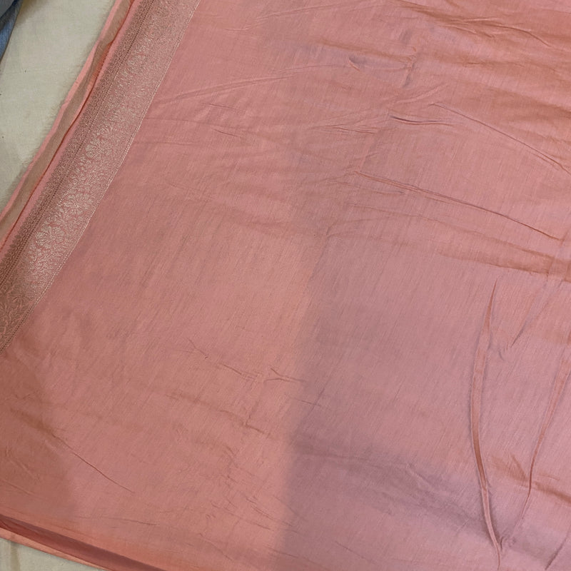 Exude sophistication in our baby pink Banarasi silk sari. Elevate your style with this artisanal piece - perfect for formal events and celebrations.