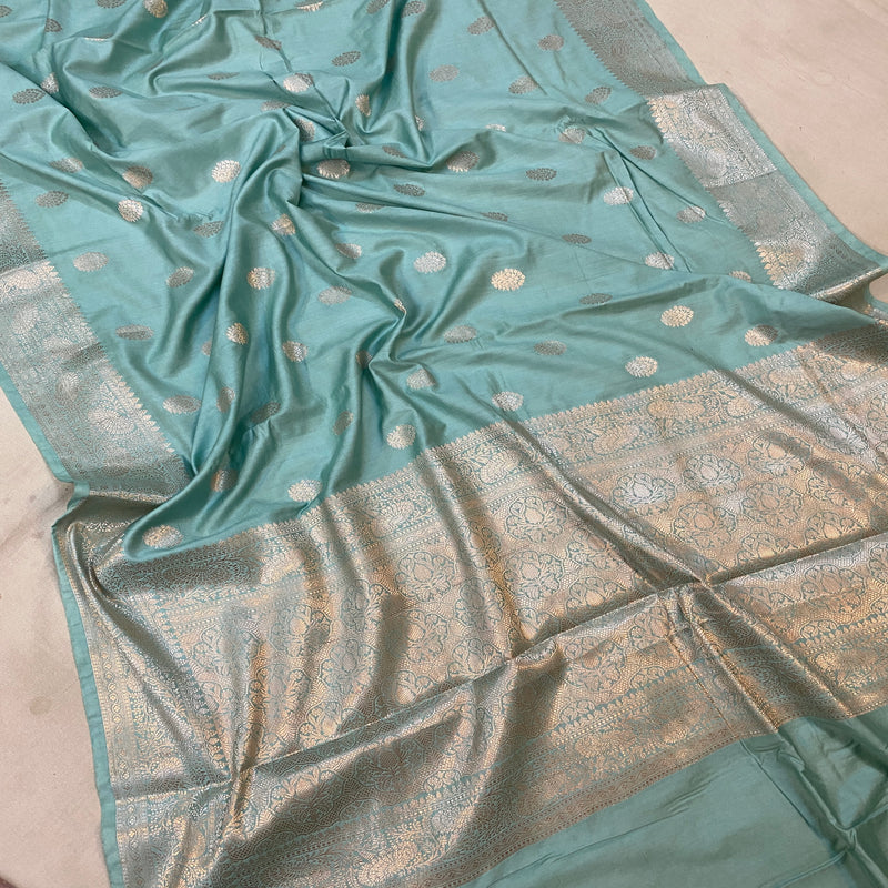 Elegant sea blue handloom crepe Banarasi silk sari, ideal for formal gatherings and cultural events. Elevate your style now!