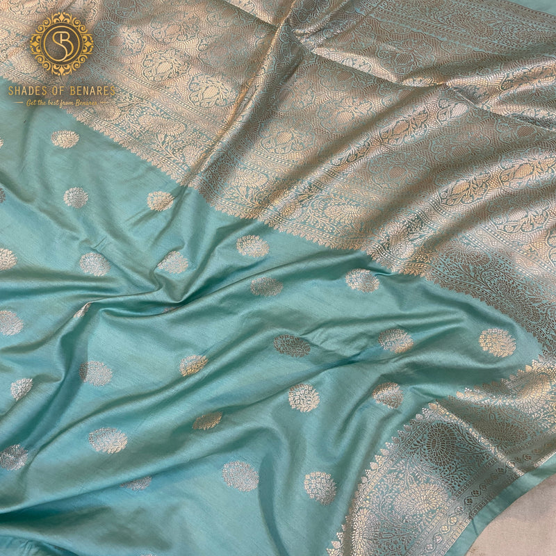 Sea blue handloom crepe Banarasi silk sari, perfect for formal gatherings and cultural events. Elevate your style with this versatile piece!