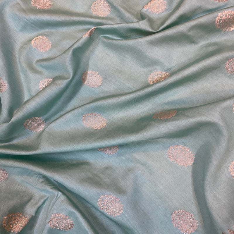 Sophisticated sea blue handloom crepe Banarasi silk sari, perfect for formal gatherings and cultural events. Elevate your style today!