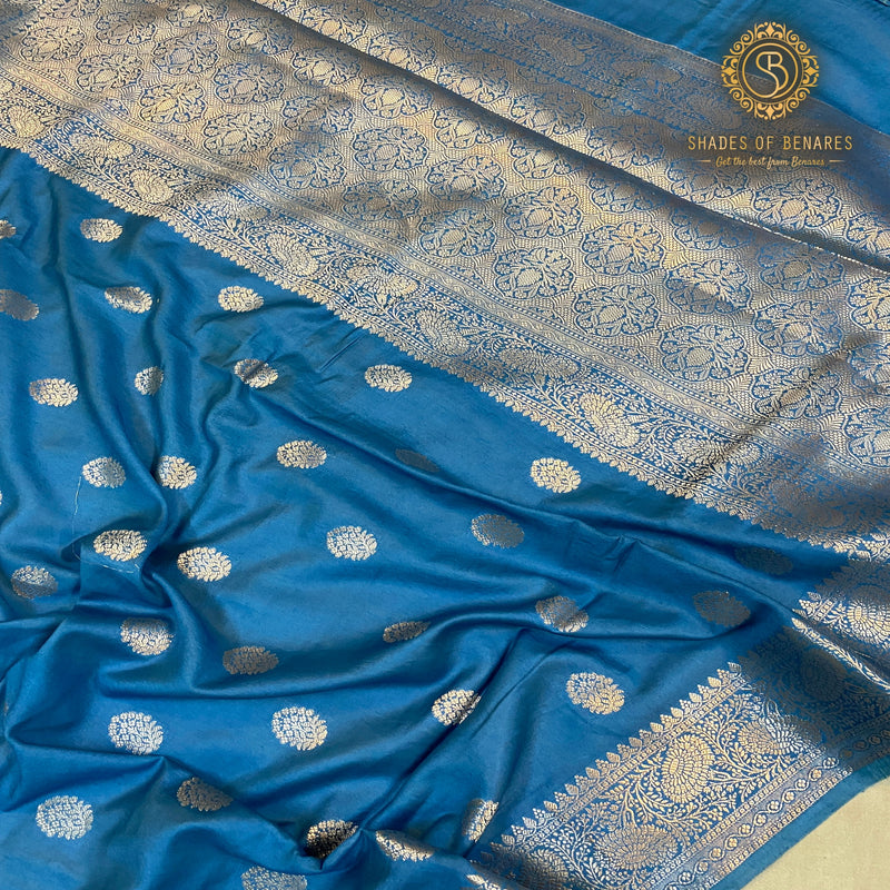 Classic blue handloom crepe Banarasi silk sari. Perfect for formal occasions and cultural celebrations. Exudes sophistication and artisanal craftsmanship. Shop now and elevate your style!