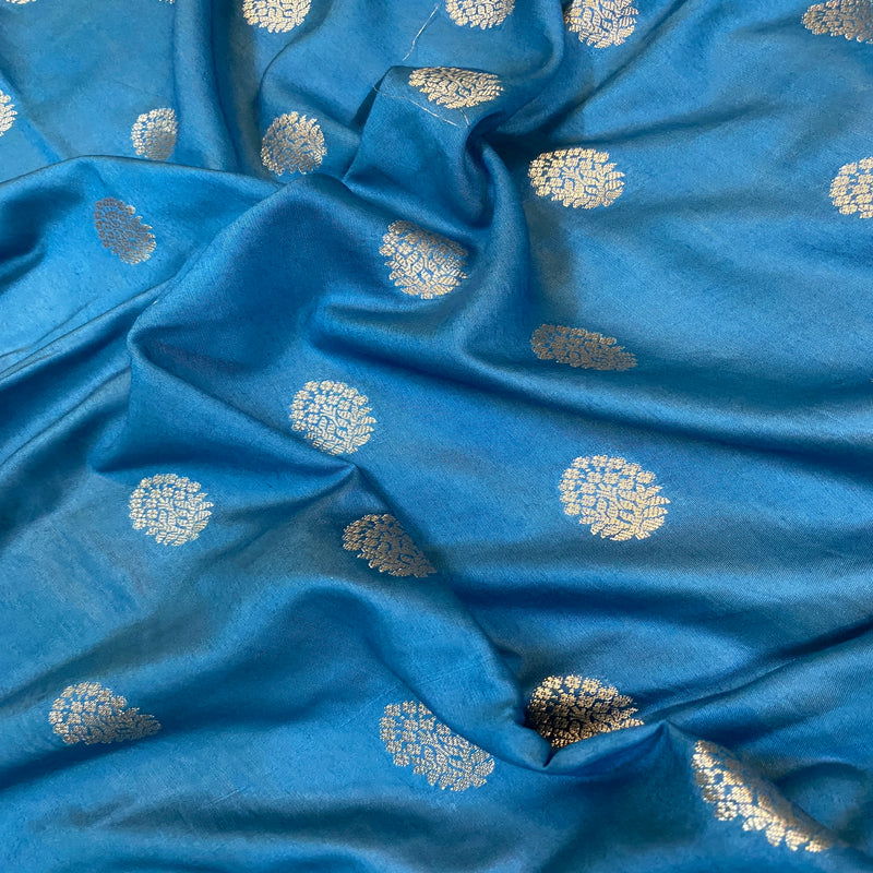 Blue handloom crepe Banarasi silk sari for formal occasions & cultural celebrations. Elevate your style with this sophisticated piece!