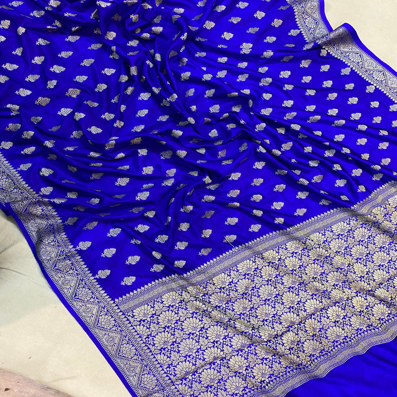 Discover the regal charm of our royal blue handloom crepe Banarasi silk sari. Perfect for formal events and cultural festivities, this sari embodies opulence and artisanal craftsmanship. Elevate your style with this versatile piece! Shop now.