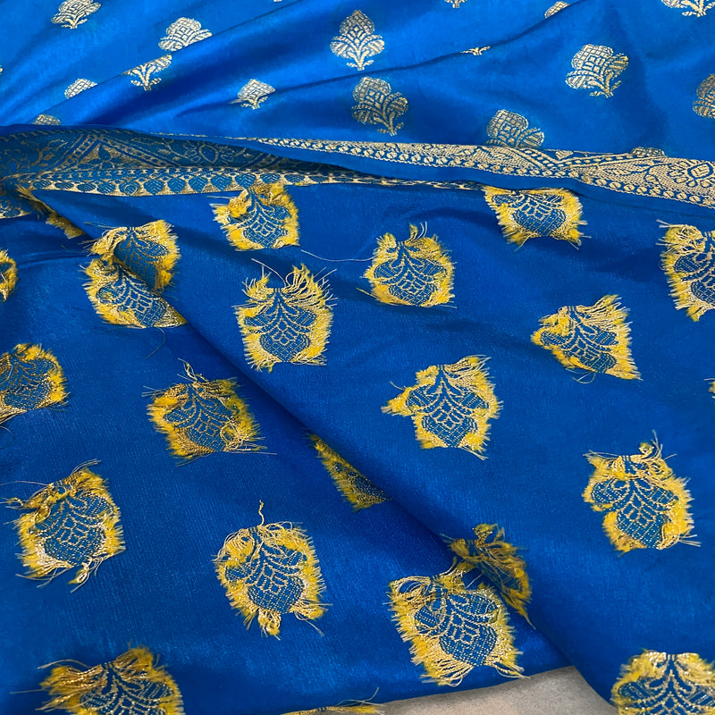 Embrace elegance with our blue handloom crepe Banarasi silk sari, crafted for formal events and festive celebrations. Shop now to elevate your style!