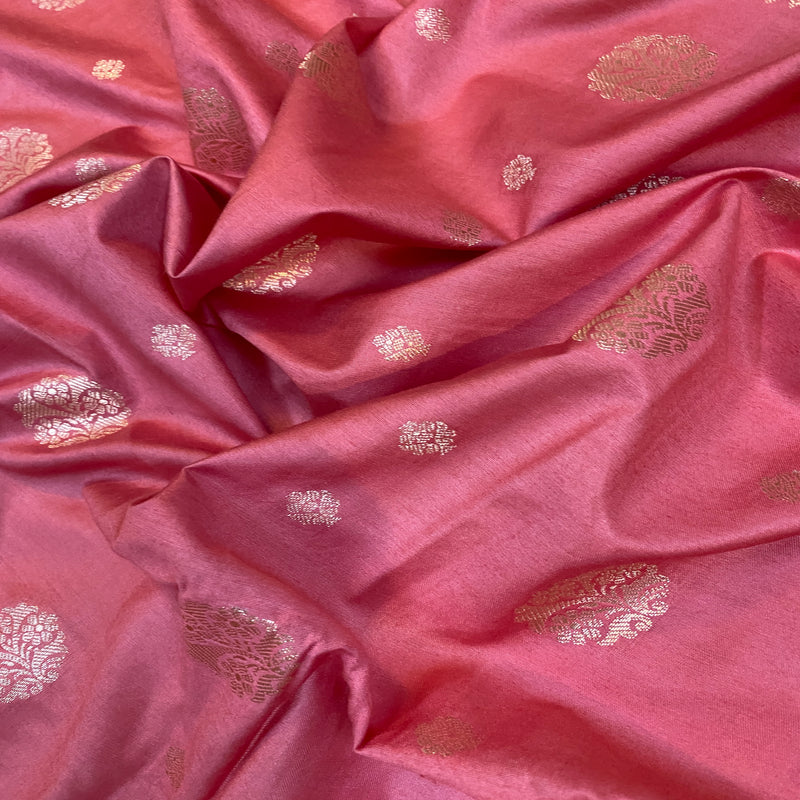 Elevate your style with this luxurious pink handloom crepe Banarasi silk saree. Handcrafted to perfection, featuring intricate patterns in vibrant pink.