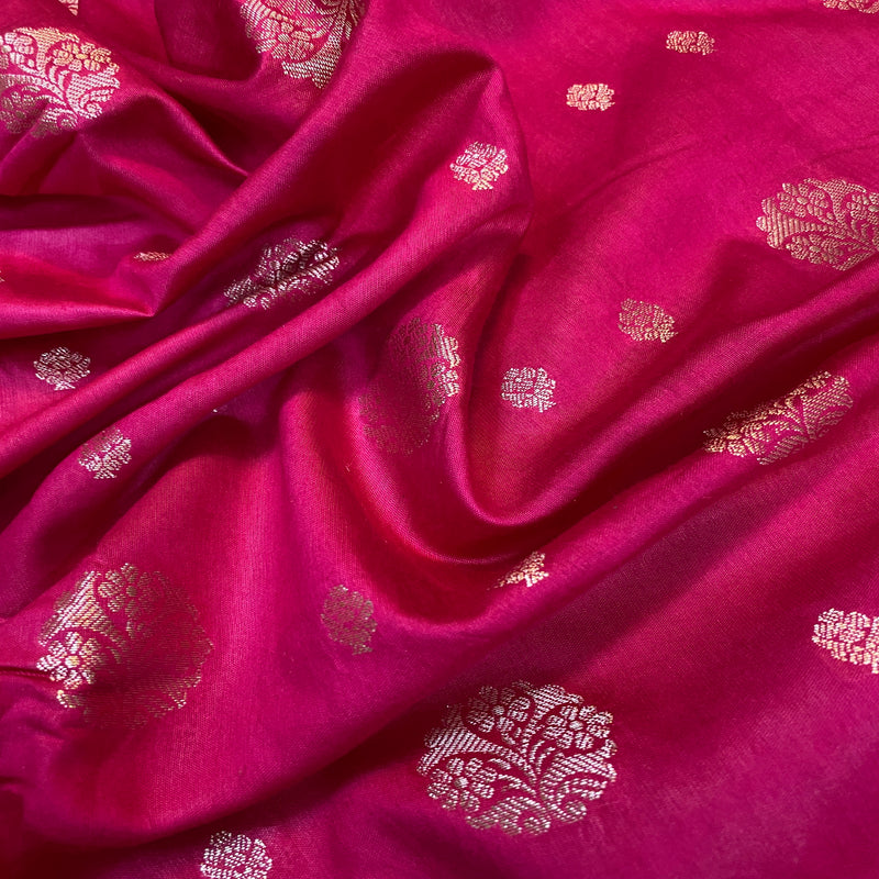 Vibrant hot pink handloom crepe Banarasi silk sari with intricate details. Versatile piece for weddings, festivals, or formal events.