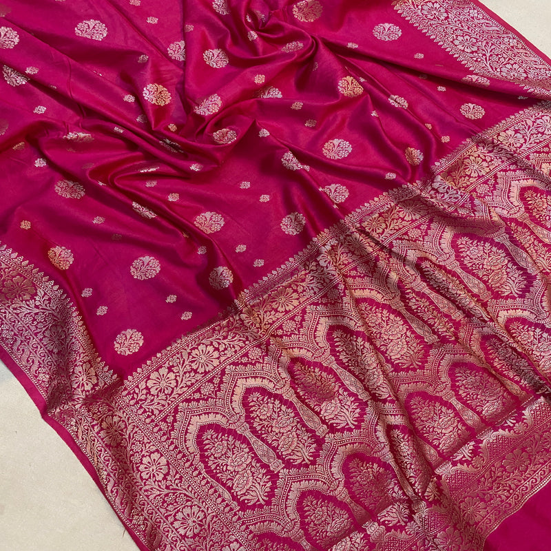 Luxurious hot pink handloom crepe Banarasi silk sari, perfect for weddings, festivals, or formal events. Embrace Indian textile elegance.