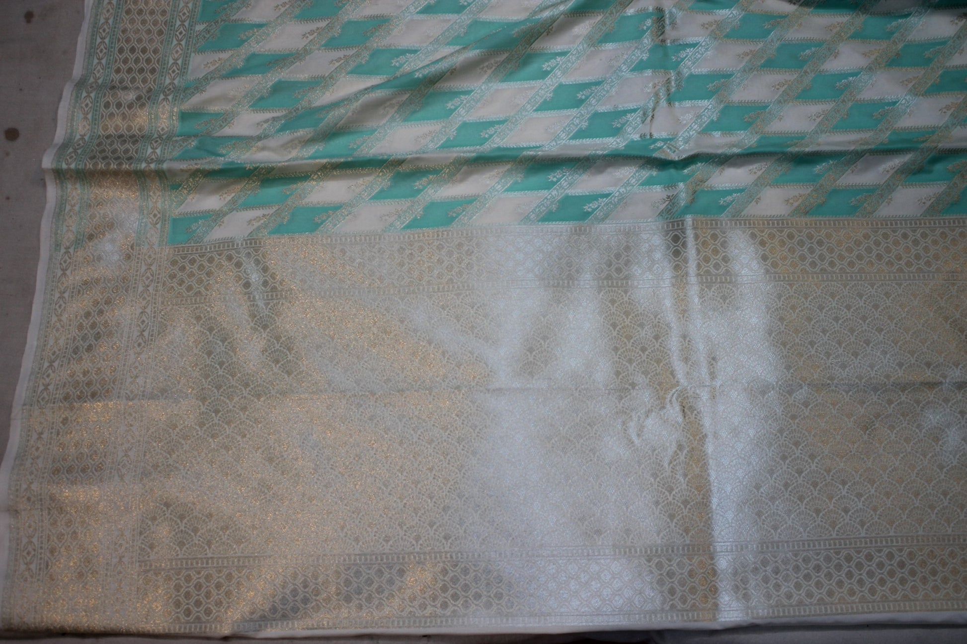 Tranquil Elegance: Sea Green and White Handloom Pure Silk Banarasi Saree by Shades Of Benares - banarasi - banarasi saree shop