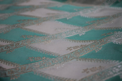 Tranquil Elegance: Sea Green and White Handloom Pure Silk Banarasi Saree by Shades Of Benares - banarasi - banarasi saree shop