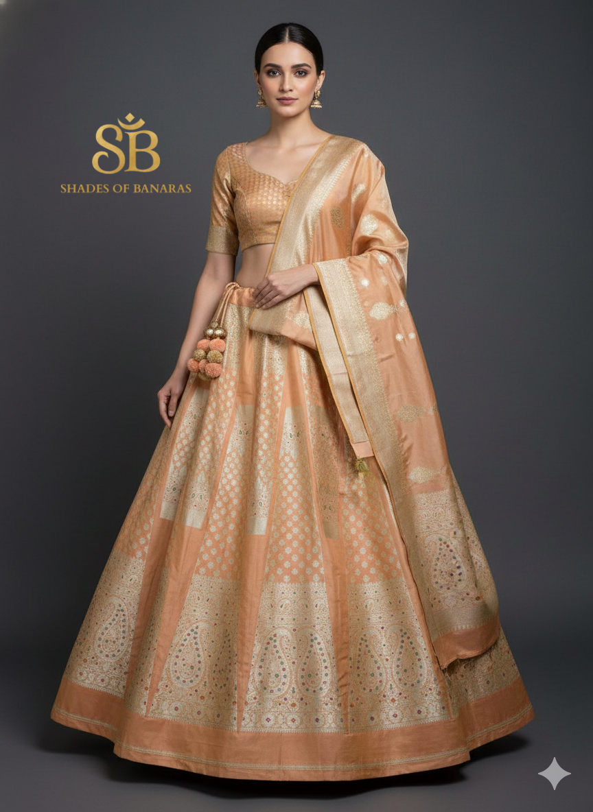 Peach Whisper Luxe Couture Banarasi Lehenga — Soft Heirloom Elegance by Shades Of Banaras - banarasi - banarasi saree shop - banarasi saree manufacturers - banarasi saree wholesale - banaraasi sarees