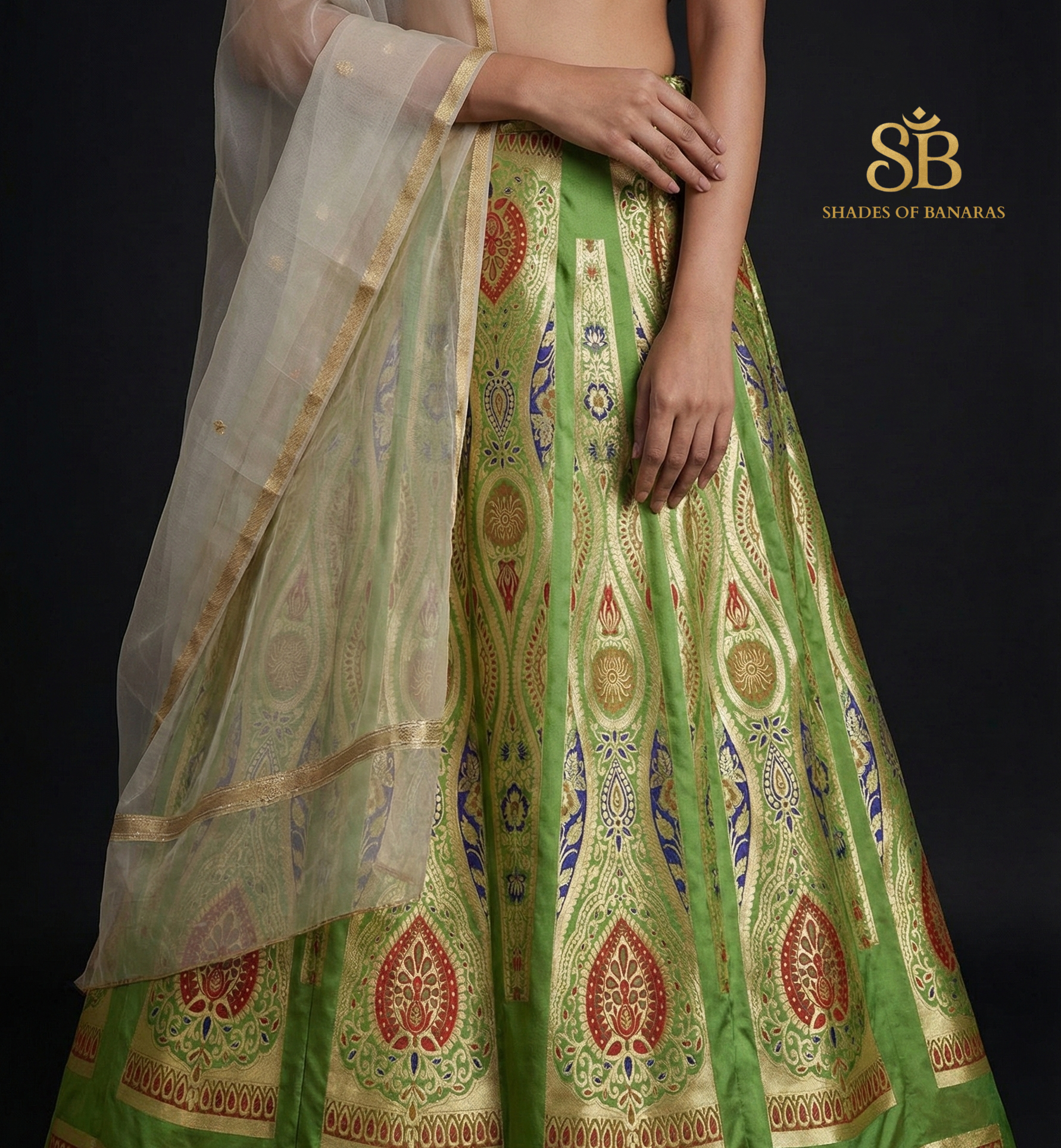 Emerald Aura Luxe Couture — Green Banarasi Silk Lehenga by Shades Of Banaras - banarasi - banarasi saree shop - banarasi saree manufacturers - banarasi saree wholesale - banaraasi sarees