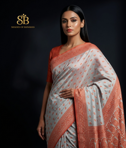 White & Peach-Orange Hand-Embroidered Cotton Banarasi Sari by Shades Of Banaras - banarasi - banarasi saree shop - banarasi saree manufacturers - banarasi saree wholesale - banaraasi sarees - banarasi sari - banarasi saris - silk saree - silk sari - wedding saree - wedding sari - designer sari - wedding collection - gifting