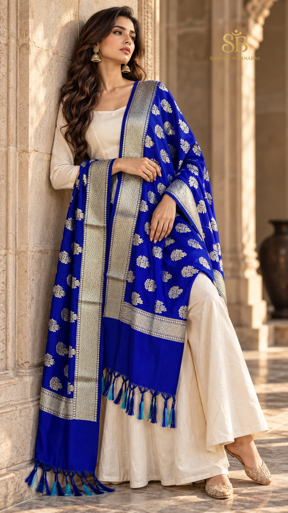 Cobalt radiance blue katan soft silk Banarasi handloom dupatta with cutwork butis from Banaras, draped over a cream suit