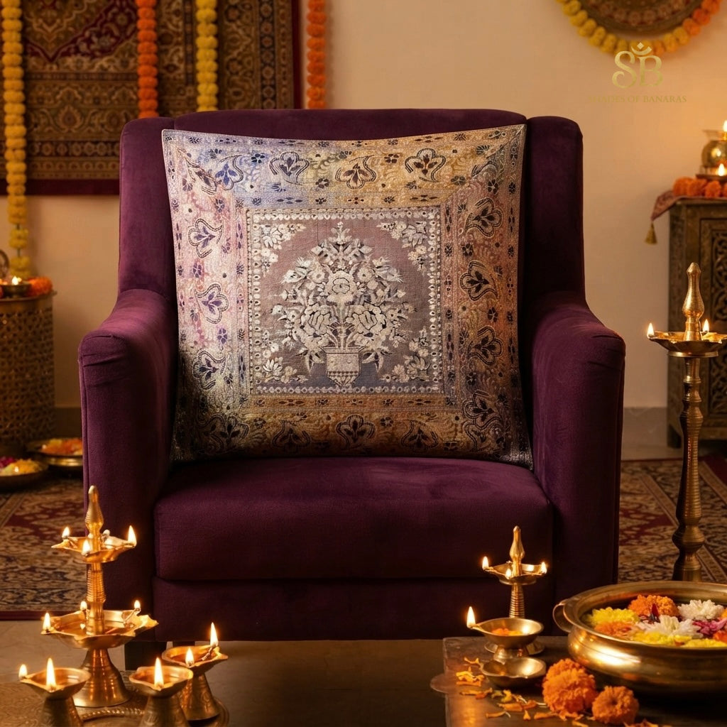 Multicolor brocade Banarasi cushion cover with floral bouquet on an aubergine velvet chair