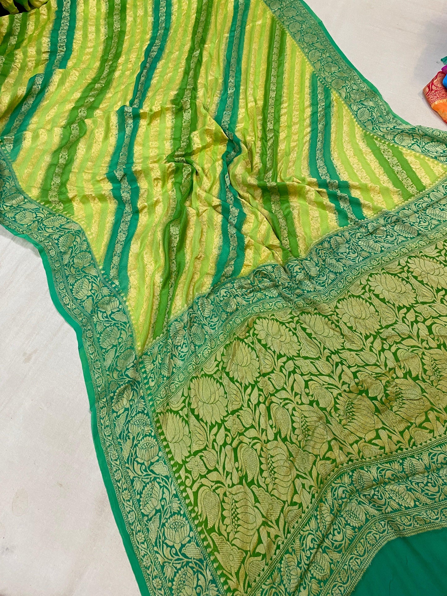 Exquisite Craftsmanship: Green Rangkaat Weaving Pure Khaddi Georgette Banarasi Sari by Shades Of Benares - banarasi - banarasi saree shop