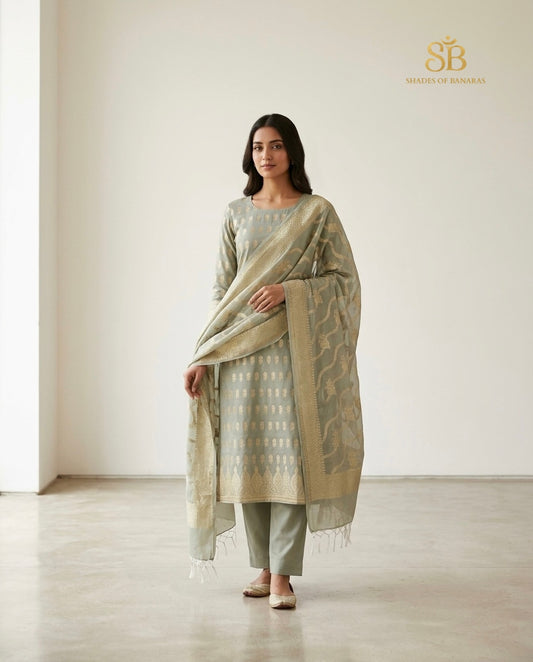 Sage green pure cotton silk Banarasi handloom unstitched suit set on white backdrop