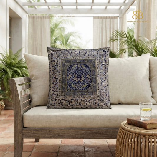 Indigo blue pure brocade Banarasi handloom cushion cover with circular medallion motif on a veranda sofa