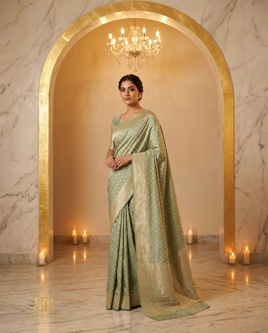 Pastel sage green pure Katan silk Banarasi handloom saree by candlelight