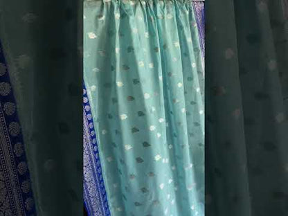 Handwoven Blue Pure Chiffon Banarasi Sari exudes timeless elegance and versatility. Perfect for making a lasting impression.