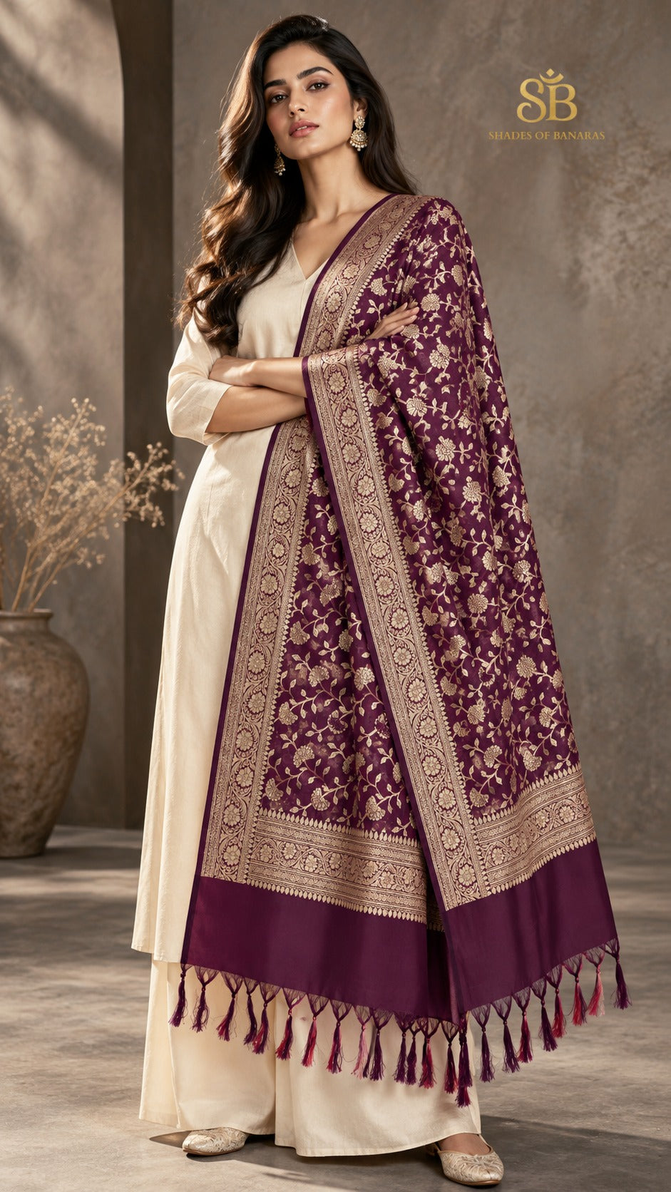 Royal plum wine katan soft silk Banarasi handloom dupatta with all-over cutwork jaal from Banaras, draped over a cream suit