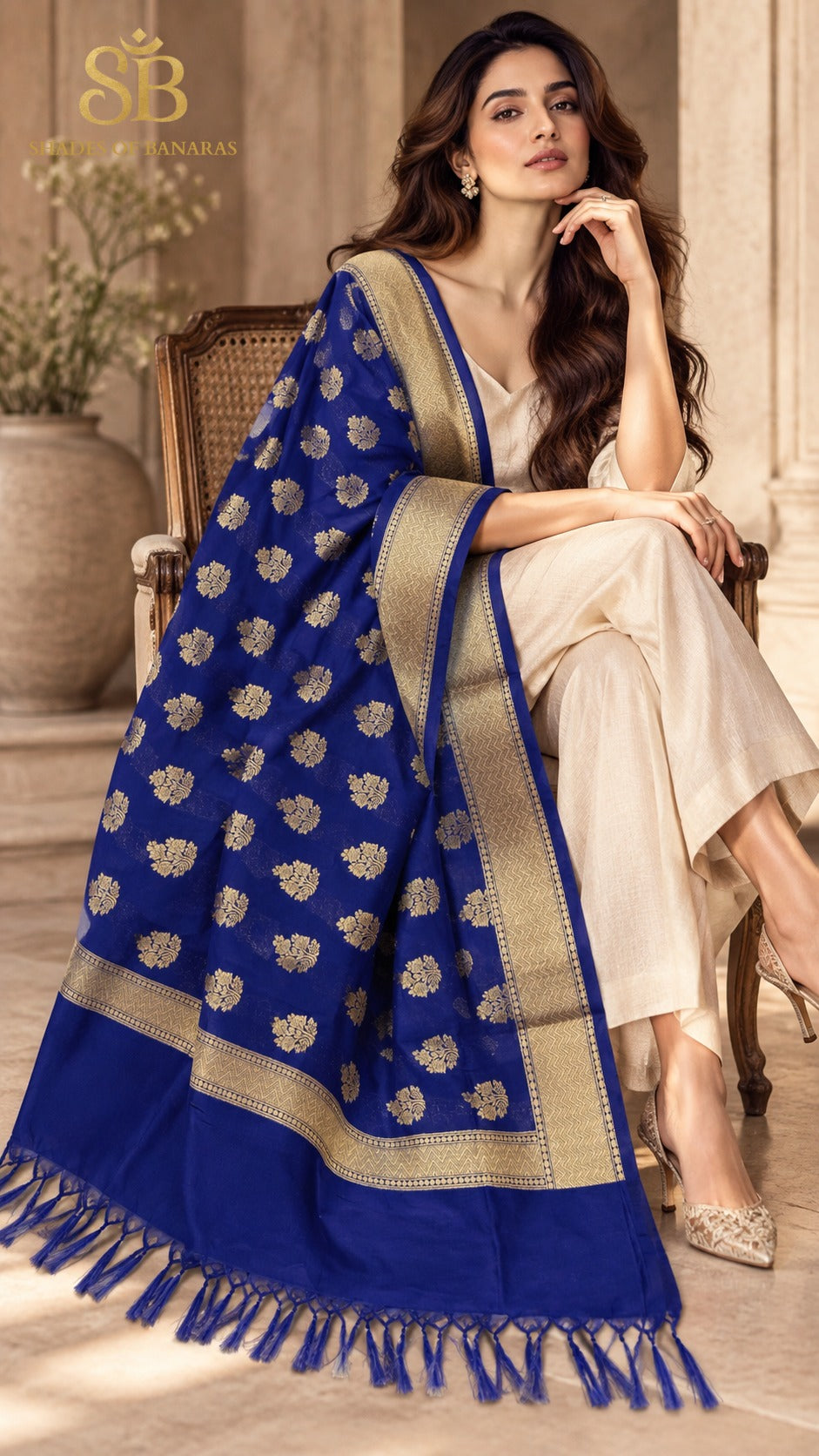 Royal sapphire blue katan soft silk Banarasi handloom dupatta with gold cutwork butis from Banaras, draped over a cream suit