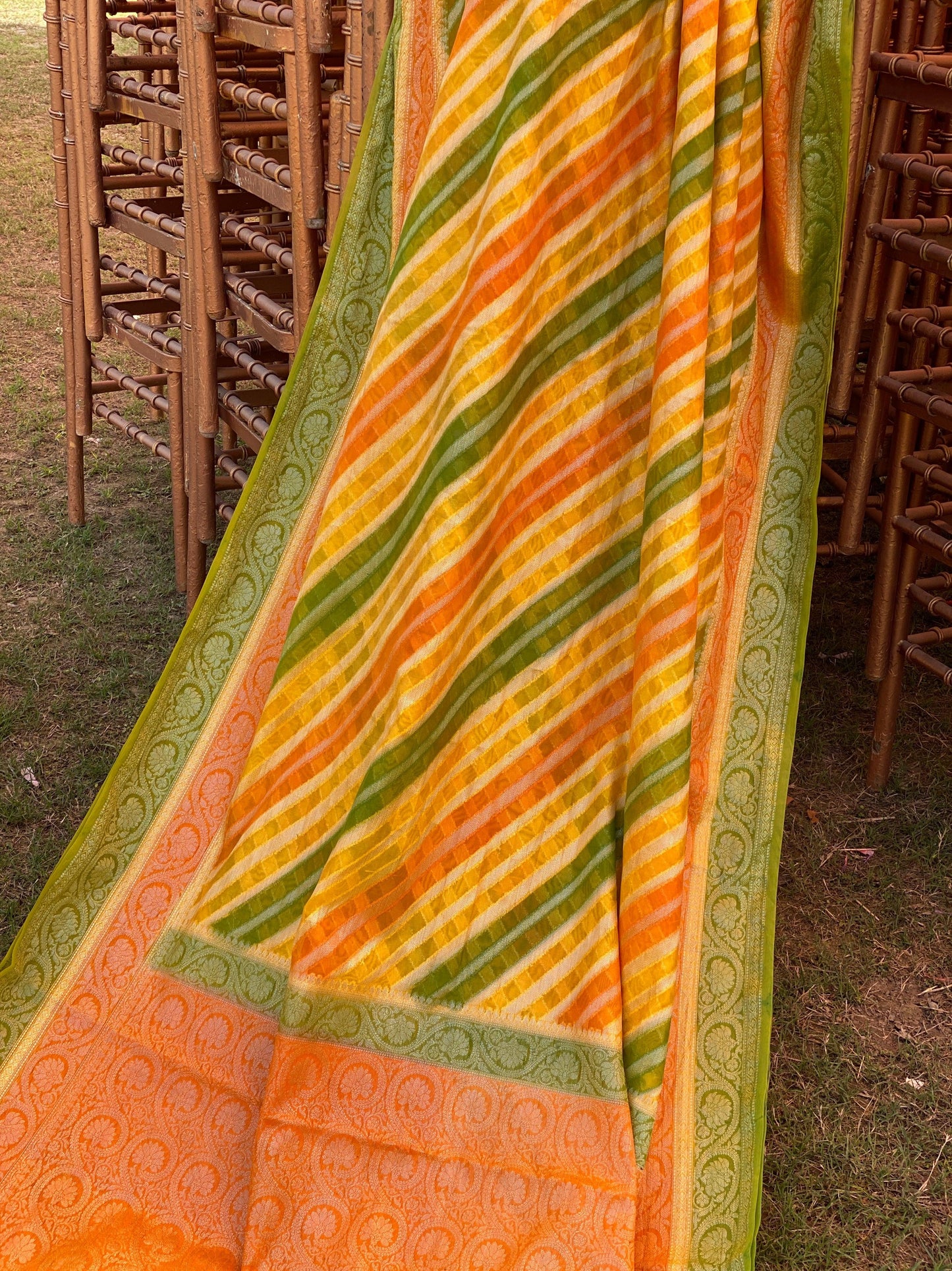 Yellow Orange & Green Pure Banarasi Khaddi Georgette Handloom Leheriya Saree by Shades Of Benares - banarasi - banarasi saree shop